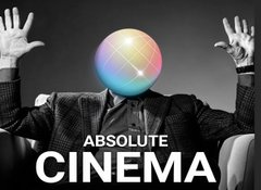 A meme image with the text "ABSOLUTE CINEMA" features a person in a suit with their hands raised, but their head is replaced with a colorful spherical object.