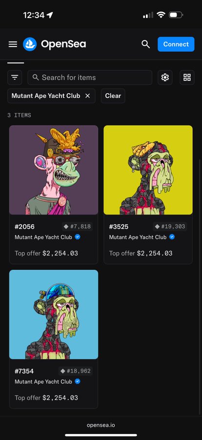 The image shows a cell phone screen displaying three different art pieces of cartoon characters wearing funny hats - two cartoon characters are on the left side with blue hats while another one has a yellow hat. The text on the screen indicates that this is an "OpenSea" advertisement for Mature Artistic Club, with various cartoon character pieces available at a cost of $34,994 or $2,999 depending on the plan purchased. This content appears to be promoting art merchandise or virtual tours in a mobile setting as seen from the cell phone screen and its various components such as texts, buttons, and screensaver.