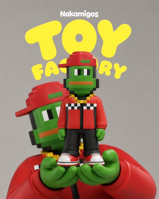 Promotional graphic featuring 'Nakamigos Toy Factory' with a 3D rendered toy figure wearing a red cap and jacket, with a larger version of the character visible in the background.