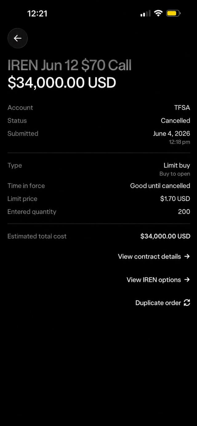 The image shows a phone screen with a black background, displaying information about a lotto game called "IREN". The text on the screen reads "IREN JUN 12 $70 CALL", which indicates that someone has won $70,000 US dollars in the lotto. The phone is turned off and placed on a table or countertop.