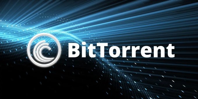 The BitTorrent logo displayed against a dark blue digital background with flowing light streaks.