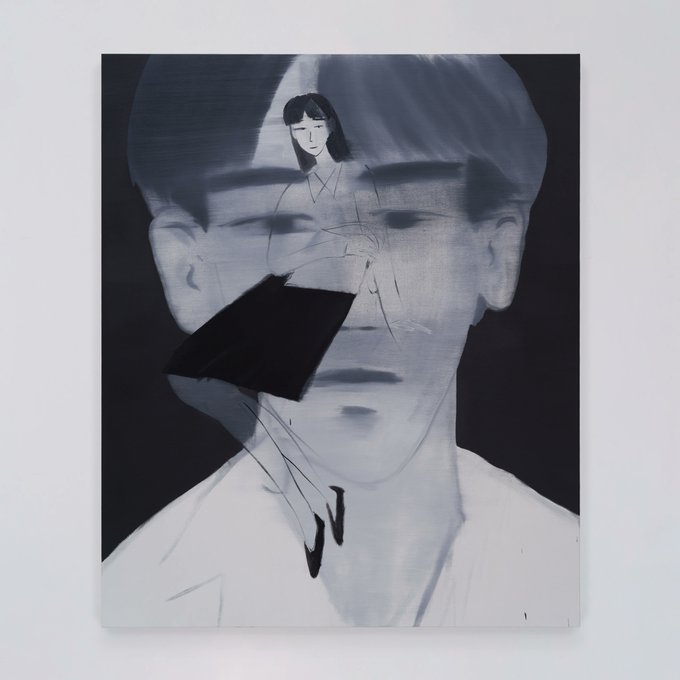 A grayscale painting on a canvas depicts an abstract portrait of a face with a smaller, clearer drawing of a woman with dark hair positioned over the forehead area, along with a solid black triangular shape.
