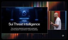 A YouTube video thumbnail titled 'Sui Threat Intelligence' featuring a presenter speaking on stage next to a screen displaying the Sui logo and the text 'What gets audited by the real-time threat response team of the largest and most secure Move language based Layer-1 blockchain?'