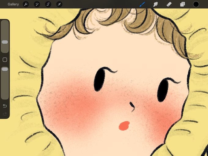 A digital drawing in a gallery app shows a stylized face with blonde curly hair, rosy cheeks, and a small red mouth.