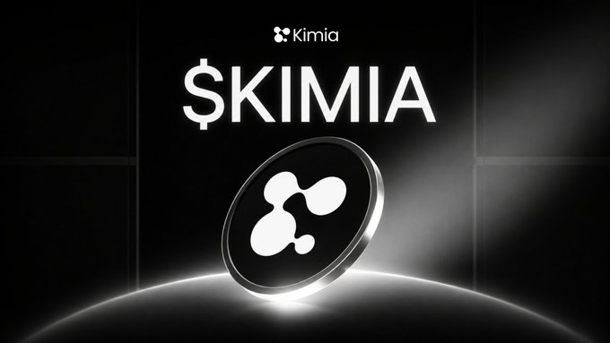 A sleek, dark promotional graphic displays the ticker "$KIMIA" in bold white text above a stylized 3D coin featuring the Kimia logo, announcing the token's launch on Jupiter Exchange. The coin rests on a glowing surface with dramatic lighting, reinforcing the post's announcement of $KIMIA's new listing.