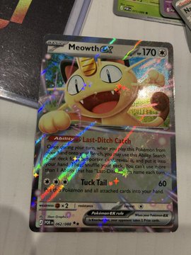 A holographic Meowth GX Pokémon trading card, numbered 170, featuring the 'Last-Ditch Catch' ability and 'Tuck Tail' attack.