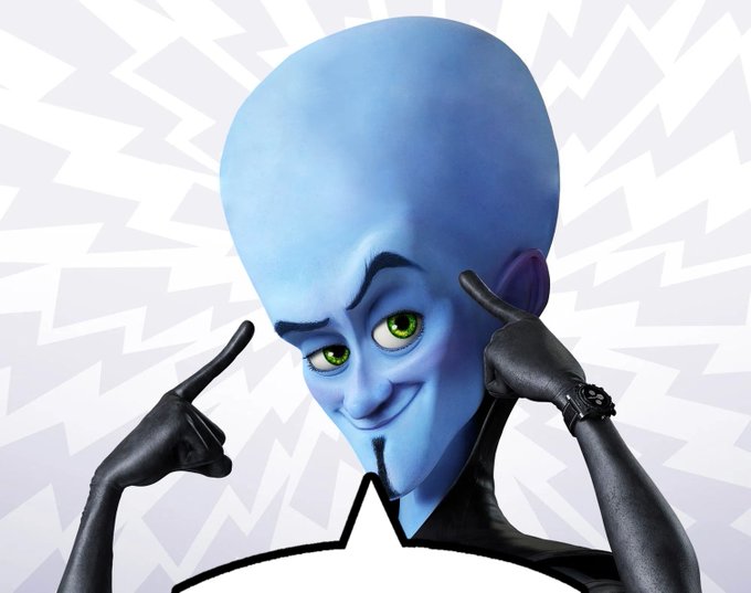 A close-up of the blue-skinned animated character Megamind pointing to his temples with black-gloved fingers, wearing a black outfit, against a background of stylized lightning bolts.