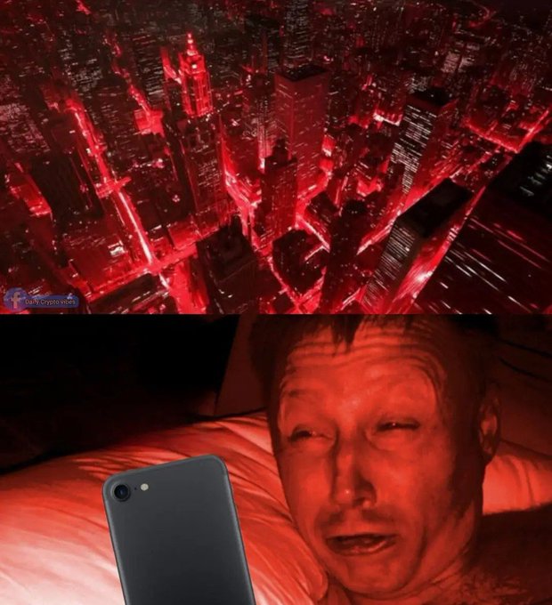 A meme showing a red-tinted cityscape above and a photo of Elon Musk holding an iPhone with a red hue applied to his face.