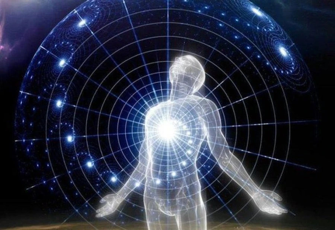 The image features a man depicted as a white figure with arms outstretched, surrounded by blue circles that appear to be part of an interactive digital art piece or a computer-generated image. The background includes stars and planets, creating a sense of depth and dimensionality in the scene. The caption "how it feels to know Ethereum is inevitable" suggests that the man's presence in this digital space might evoke feelings of curiosity, wonder, or even excitement about the possibilities offered by blockchain technology like Ethereum.