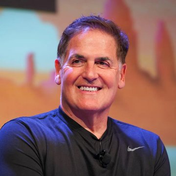 Mark Cuban smiles while wearing a black Nike shirt and lapel microphone. The image accompanies his statement that “Chips as an asset class will be the new crypto.”