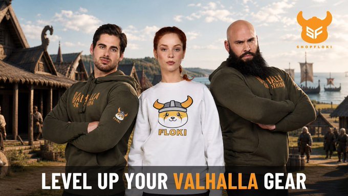 The image features three people standing together, each wearing a hoodie that has a Viking theme. The text "level up your Valhalla gear" is written above them, indicating that they are promoting a new line of Viking-themed clothing or accessories. The background shows a scenic view with buildings and boats in the distance, suggesting an outdoor setting.