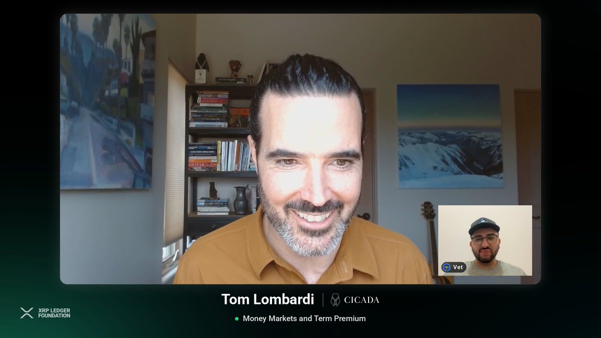 Tom Lombardi of Cicada discusses "Money Markets and Term Premium" alongside a guest labeled "Vet" during an XRP Ledger Foundation video call, with bookshelves and landscape paintings visible in his home office setting—visually supporting the post's theme of exploring lending protocols and the Loan Broker role on the XRPL.