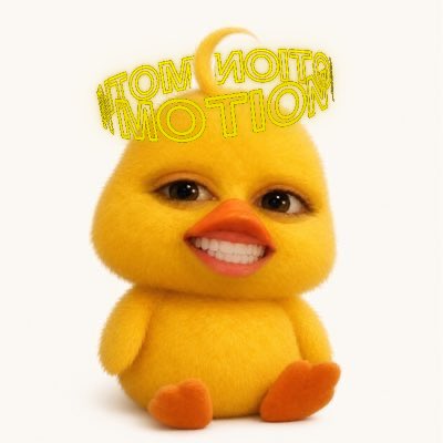 A yellow fuzzy chick toy figure with a smiling human face and orange beak, topped with a yellow plastic tiara that reads 'PROM MOTION' in green lettering.