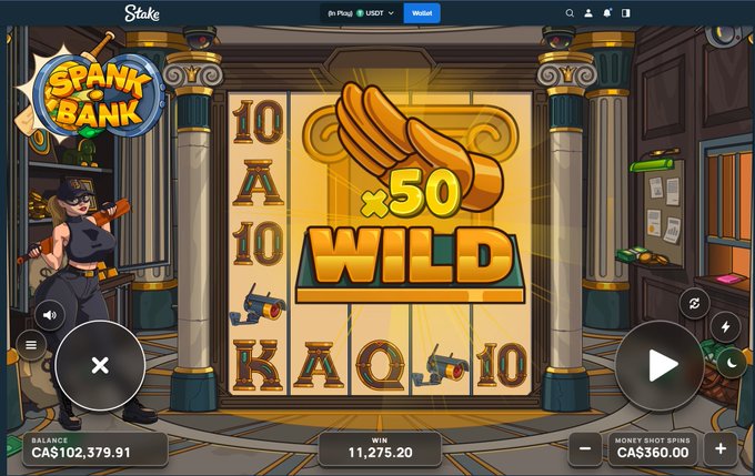 A screenshot of a 'Spank the Bank' slot game on Stake, showing a 'WILD x50' bonus on the reels with a balance of CA$102,379.91 and a win of 11,275.20.