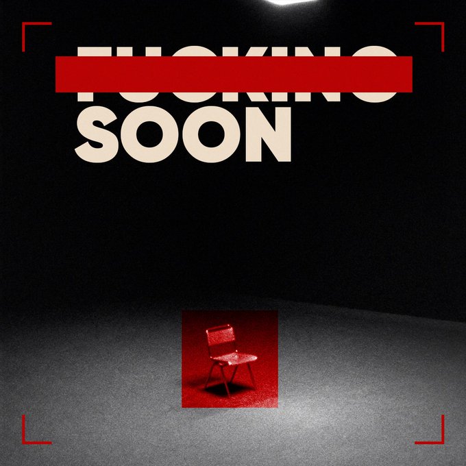 A dark, stylized 'FUCKING SOON' graphic with red censorship bars and a single red chair in an empty room under a spotlight.
