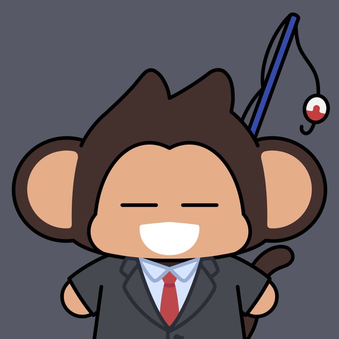 A cartoon illustration of a smiling monkey character wearing a dark suit jacket, a white collared shirt, a red tie, and a blue hat with a dangling red and white ornament, set against a grey background.