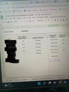 A photo of a laptop screen displaying a Google Sheets document titled 'Series A Pitch and Feedback Tracker' with spreadsheet data showing investment amounts, status, and potential ownership percentages.