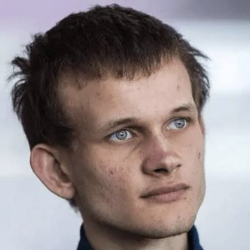A close-up portrait of a young man with short dark hair and striking blue eyes, gazing off to the side with a thoughtful expression against a blurred, light-colored background. His contemplative look appears fitting for the accompanying news about Ethereum developers deliberating the technical complexities of competing account abstraction proposals (EIP-8141 and EIP-8130) ahead of the Hegotá upgrade.