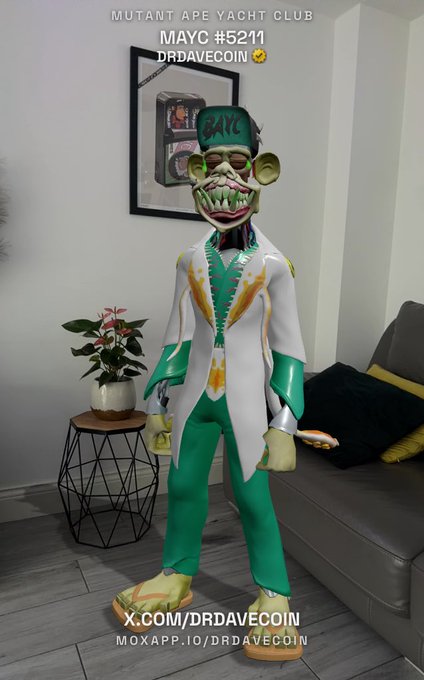 A 3D animated character in a green and white outfit labeled 'MAYC #5211 DRDAVECOIN' from the 'Mutant Ape Yacht Club' stands in a modern living room.