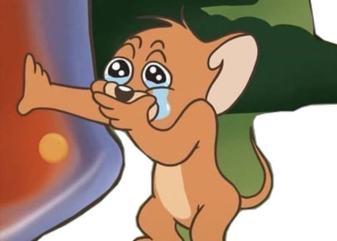 A cartoon mouse (resembling Jerry from Tom and Jerry) crying with one tear while leaning against a large object, illustrating the post's melancholic reflection on the crypto industry's shift from celebrating modest four-figure gains to anxiously awaiting massive "moonpay" outcomes.