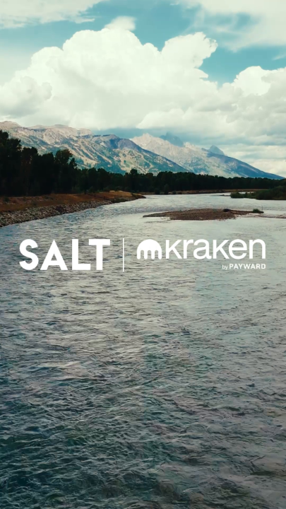 A scenic river flows through a Wyoming valley with mountains and dramatic clouds in the background, overlaid with the text "SALT | Kraken by Payward." The natural landscape complements the post's mention of attending the Wyoming Blockchain Symposium for the third consecutive year, capturing the state's rugged beauty.