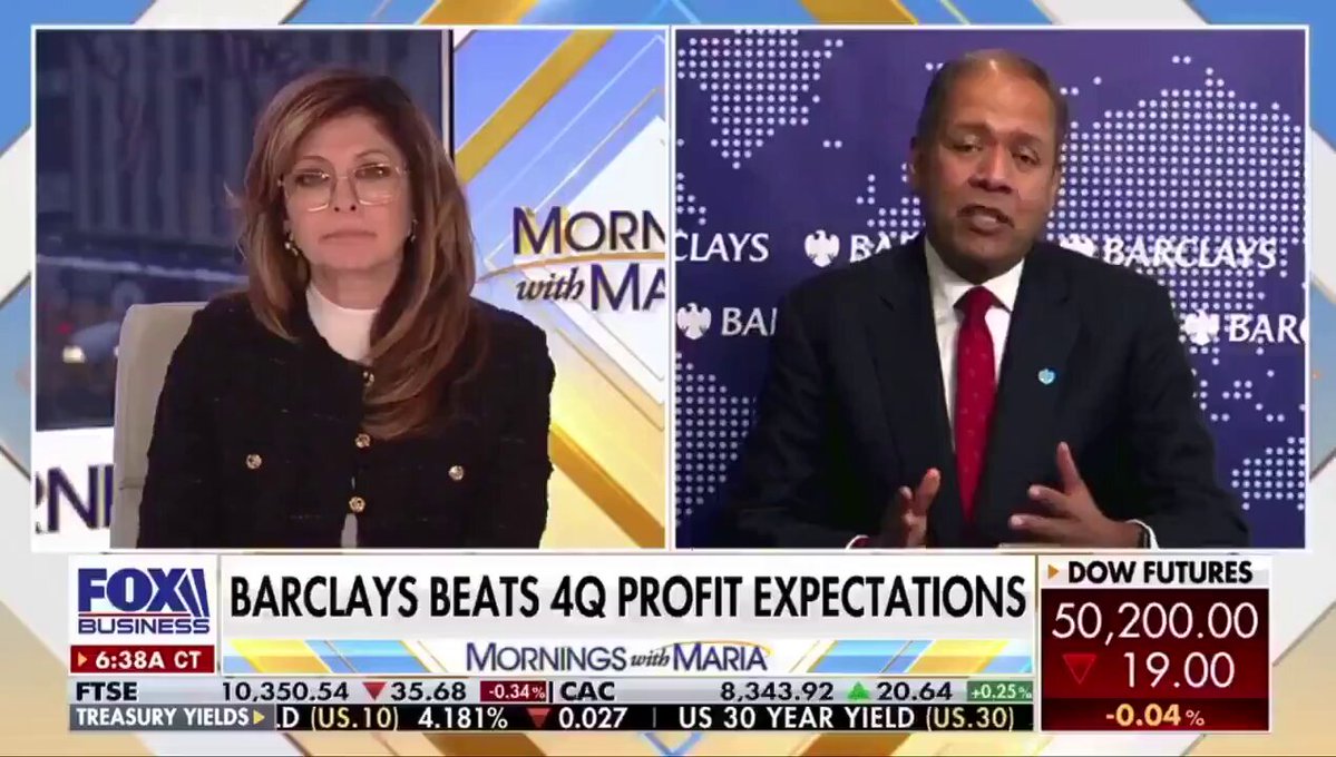 The image shows a news segment featuring two people, one of whom appears to be wearing a suit and tie while the other has a more casual appearance. They are discussing the potential benefits of investing in cryptocurrencies like XRP. The background reveals that this is an Fox News segment with a blue and white color scheme.