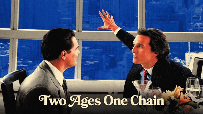 Two men in suits sit across from each other at a restaurant table, one gesturing upward with his hand, with the text 'Two Ages One Chain' overlaid at the bottom.
