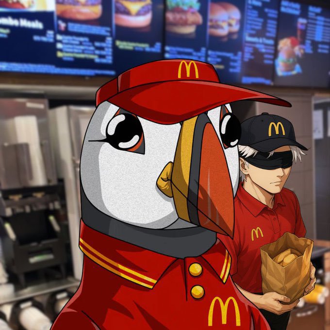 An illustration of a puffin and a person in a black cap and sunglasses, both wearing red McDonald's uniforms, with the person holding a paper bag of food inside a McDonald's restaurant.