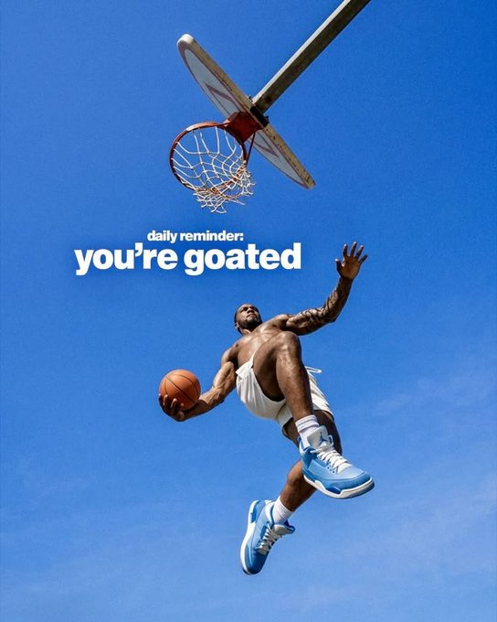 A low-angle photo of basketball player Ja Morant mid-air about to dunk, with overlaid text reading 'daily reminder: you're goated'.