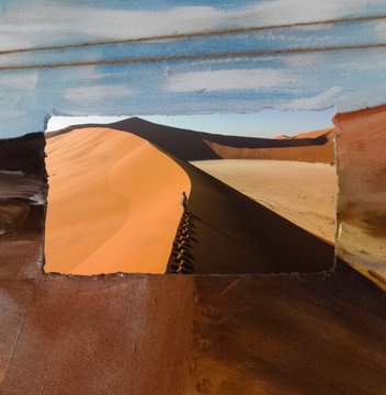 The image features a desert scene with sand dunes, mountains, and a person walking along one of the dunes. The photo has been edited or cropped to include a small square frame around the main image, which adds an artistic touch to the overall composition. The caption above the image provides additional information about the post it was taken from, indicating that it is a "Art" post with a focus on close-ups of various elements in the scene.