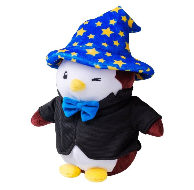 A plush toy of the winking Pudgy Penguin NFT character, dressed in a black suit jacket with a blue bow tie and a blue wizard hat covered in yellow stars, is now available as a real stuffed animal at Target stores.

The image directly illustrates the Vietnamese post's announcement that the popular Pudgy Penguins NFT collection has launched official plush toys sold at Target retail locations across the U.S.