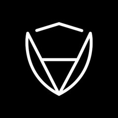 A white minimalist logo featuring a shield design with an inverted triangle inside, set against a black background.