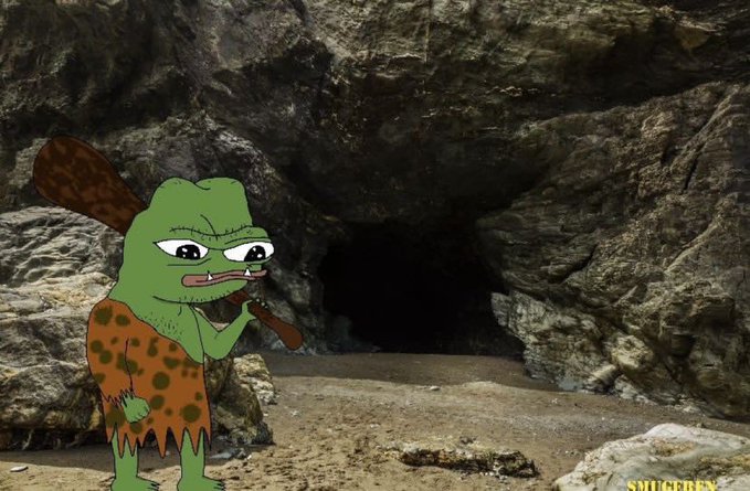 A cartoon caveman with a wooden club stands in front of a rocky cave entrance, with a 'SMUGGLEY' watermark in the corner.