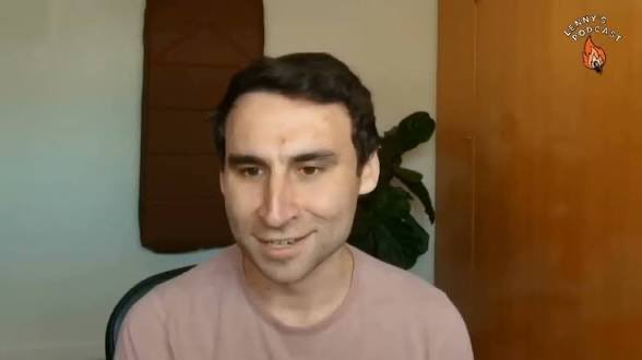A man in a pink t-shirt speaks directly to the camera in a casual indoor setting, with a logo reading 'FENNY'S PODCAST' visible in the top right corner.
