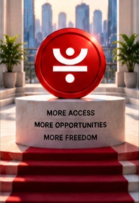 A promotional graphic featuring a large red circular logo with a stylized symbol on a marble pedestal, accompanied by the text 'MORE ACCESS MORE OPPORTUNITIES MORE FREEDOM' with a red carpet leading up to it.