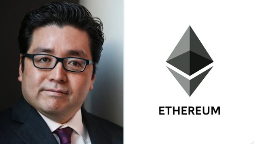 The image features a man wearing glasses, standing next to a logo for Bitcoin. The man has his head tilted slightly to the left side of the frame. The logo for Bitcoin is prominently displayed against a white background with black text that reads "ETHEREUM".
