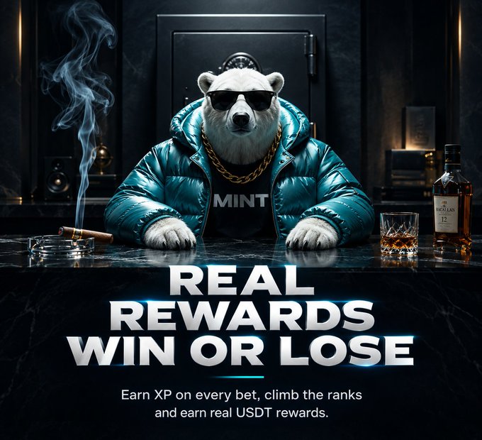 A polar bear wearing sunglasses and a teal puffer jacket sits at a sleek bar with a whiskey glass and cigarette, advertising "REAL REWARDS WIN OR LOSE - Earn XP on every bet, climb the ranks and earn real USDT rewards." The image ties directly to the post's theme by showcasing the gaming/rewards aspect of the MintABear NFT collection tied to the PlayOnMint ecosystem, complementing the free mint announcement with the promise of real earning potential through the platform's XP system.