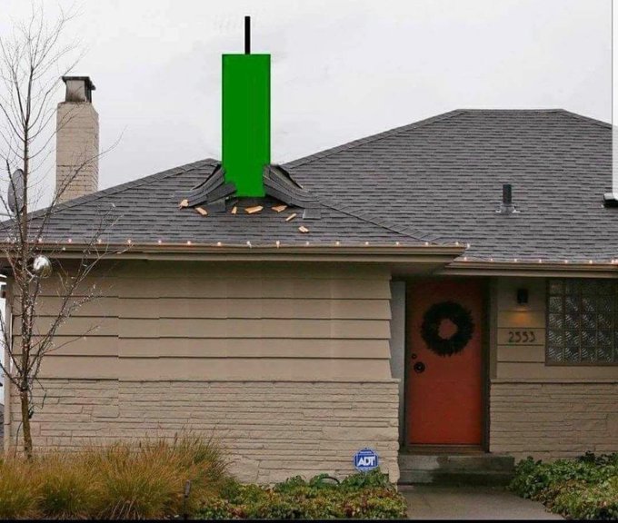 A photograph of a single-story house with a damaged roof, where a green rectangular box and an antenna have been digitally superimposed onto the missing roof section.