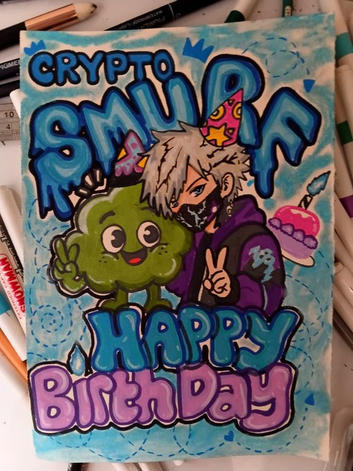 This image is a drawing with a male character wearing a mask titled Crypto Smurf44. Along with this character is a green cloud making a peace sign, and a cake with a lit candle. The text within the image gives a "Happy Birthday" message to this character.