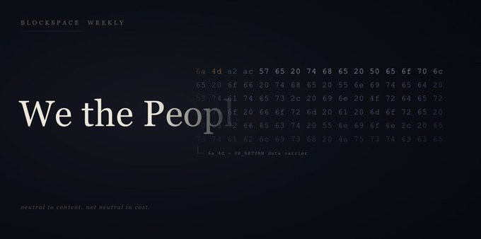 The image shows a poster with the text "We The People" written in white letters against a dark background, which appears to be a banner or a sign. The poster also includes a list of numbers arranged in a grid format, possibly representing data or statistics related to the topic of the poster.