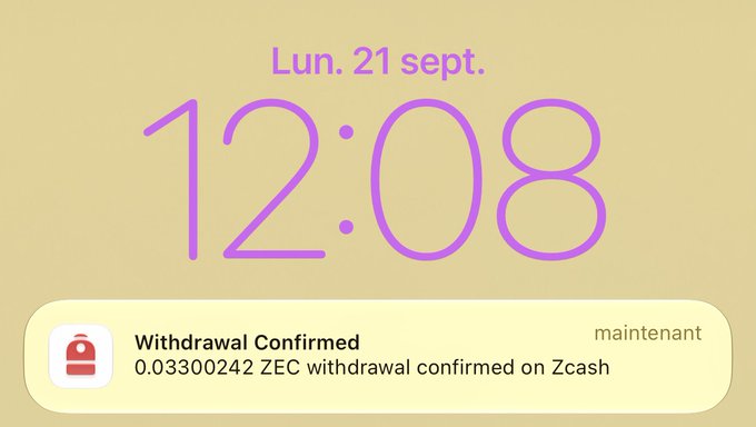 A smartphone lock screen showing the time '12:08' on 'Lun. 21 sept.' with a notification confirming a withdrawal of '0.03300242 ZEC' on Zcash.