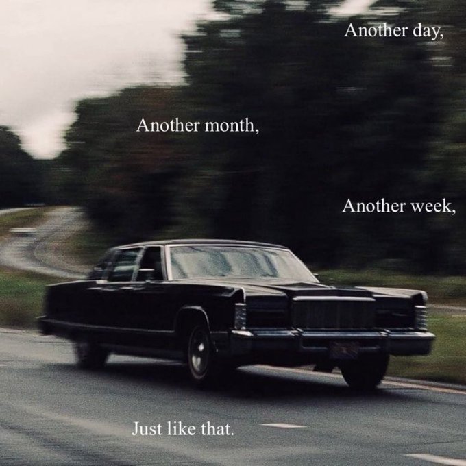 The image shows a black car driving down a road, with text written above and below the car that reads "Another day. Another week." The text also includes an inspirational quote about embracing life's journey.