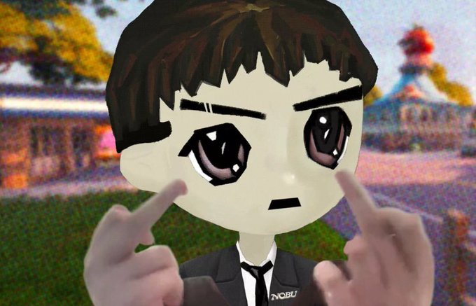 A cartoon character with dark hair and a suit points fingers to their cheeks against a blurred, colorful background.
