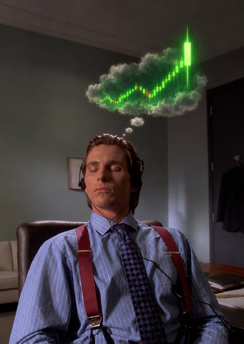A man in a blue striped shirt, tie, and red suspenders sits with his eyes closed, wearing headphones, while a thought bubble above him displays a green rising stock chart.