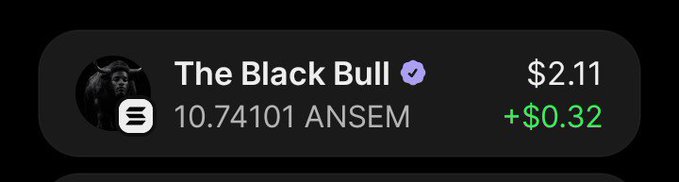 A mobile interface showing 'The Black Bull' account with a verified checkmark, holding 10.74101 ANSEM tokens valued at $2.11, showing a gain of +$0.32 in green text.