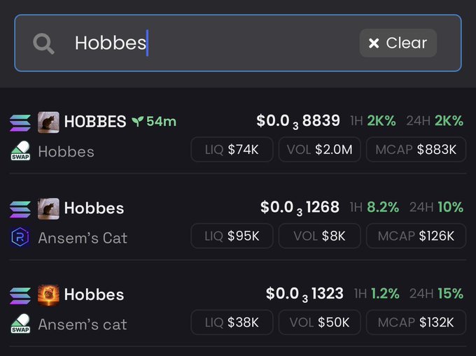 A search for "Hobbes" on a crypto trading platform returns three similar-looking meme tokens with minimal liquidity and market caps under $1M, including variants like "Ansem's Cat" and "Ansem's cat," illustrating the abundance of nearly identical low-cap coins—fitting the post's sentiment that "we need more coins."