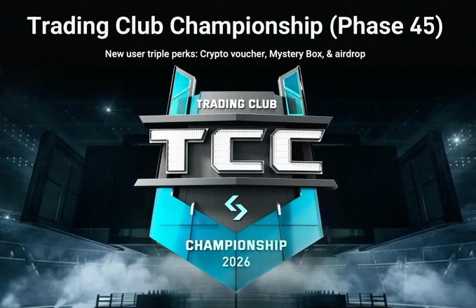 The image features a poster for a trading club championship, with a large logo of a blue shield displaying the text "TCCC" and "Trading Club Championship (Phase 45)". The background shows a stadium filled with lights, indicating that this event is taking place in an arena or stadium. The post also mentions a new user who can get three perks for their participation: a crypto-voucher, a mystery box, and airdrop.
