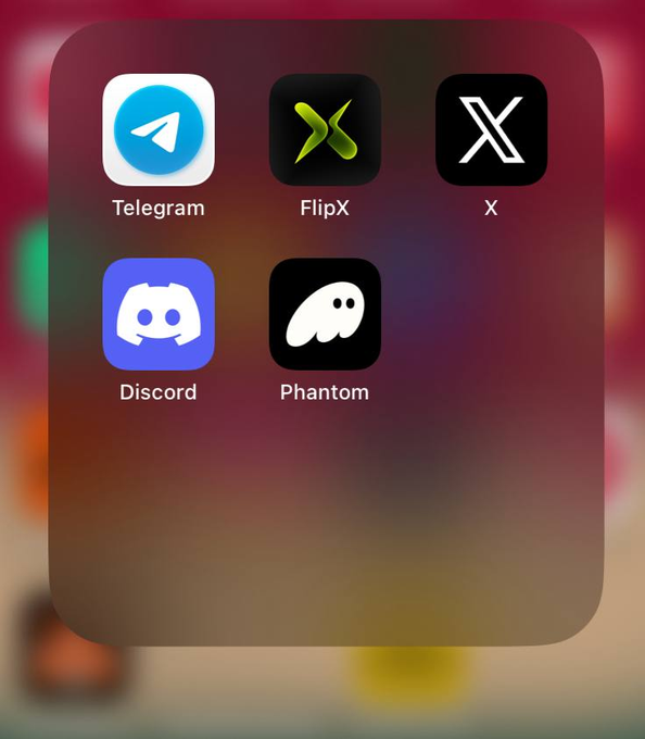 An iOS home screen folder containing app icons for Telegram, FlipX, X, Discord, and Phantom against a blurred background.