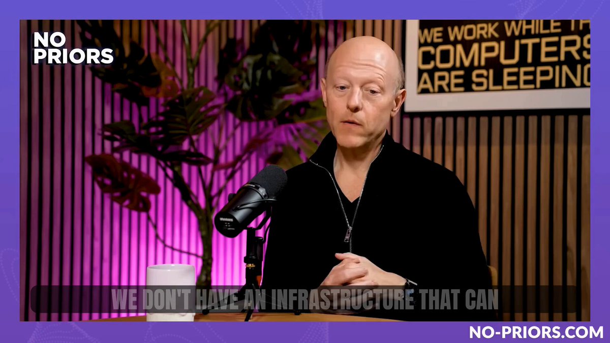The image shows a man wearing glasses speaking into a microphone while sitting behind a desk with a purple background. The text overlaying the image reads, "No Priorors @NoPriorsPod explains why the agentic economy needs programmable, real-time rails that can support dynamic endpoints, microtransactions, and activity at machine scale."