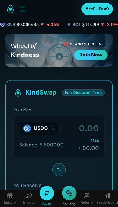 A screenshot of a mobile app interface showing a crypto swap service called 'KindSwap' with KNS and SOL prices displayed at the top, and a USDC input field showing a balance of 5.600000.